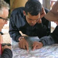 Our guides watching map with client 
